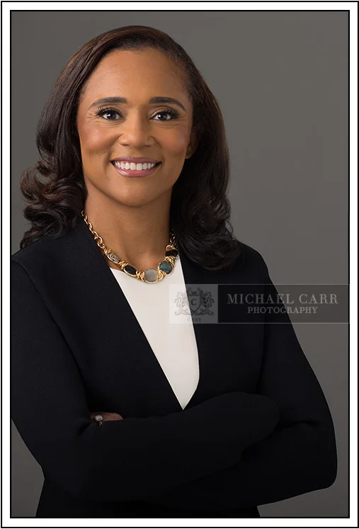 headshot-professional-woman.jpg
Professional executive headshot of a Houston businesswoman wearing a navy blazer against a dark studio background.