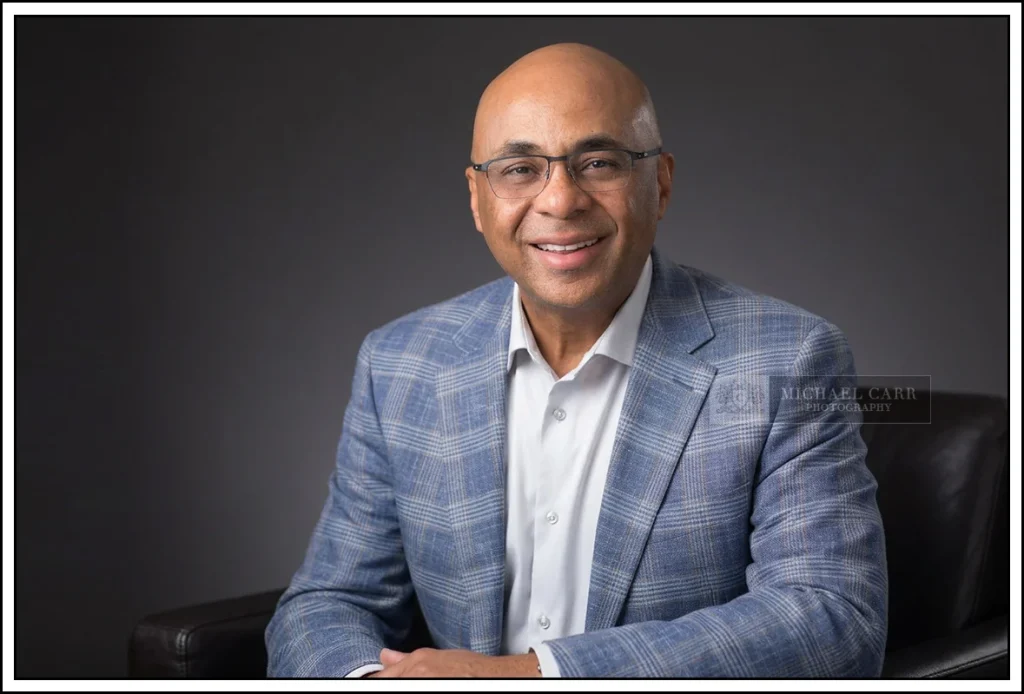 Houston Headshot Photographer Houston personal branding portrait photographed in professional office environment.