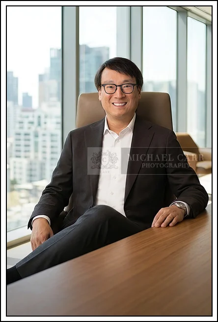 Houston Headshot Photographer Houston personal branding portrait photographed in professional office environment.