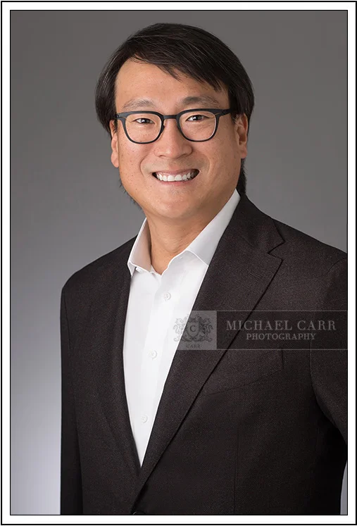 Classic corporate business headshot of Houston professional