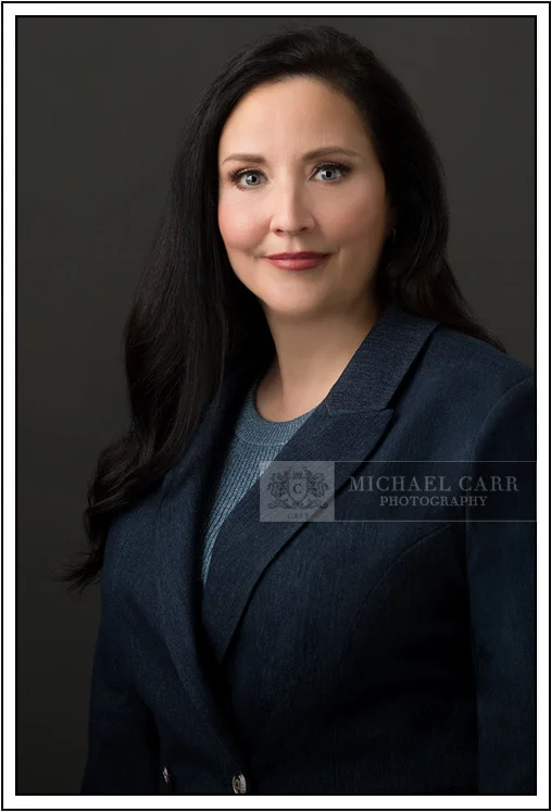Houston Headshot Photographer Professional executive headshot of a female business professional photographed in a Houston studio