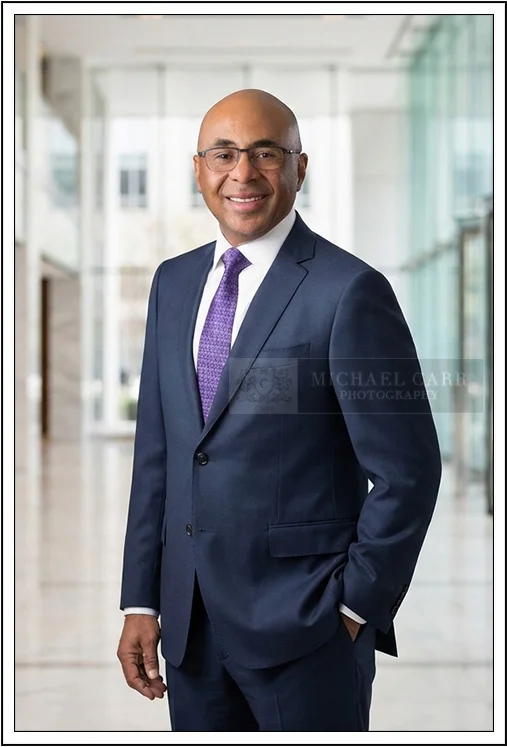 Houston Headshot Photographer Houston corporate headshot with office background
