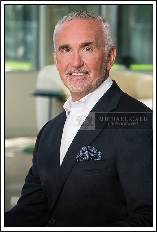 Houston Headshot Photographer Houston on-location executive portrait of senior business professional