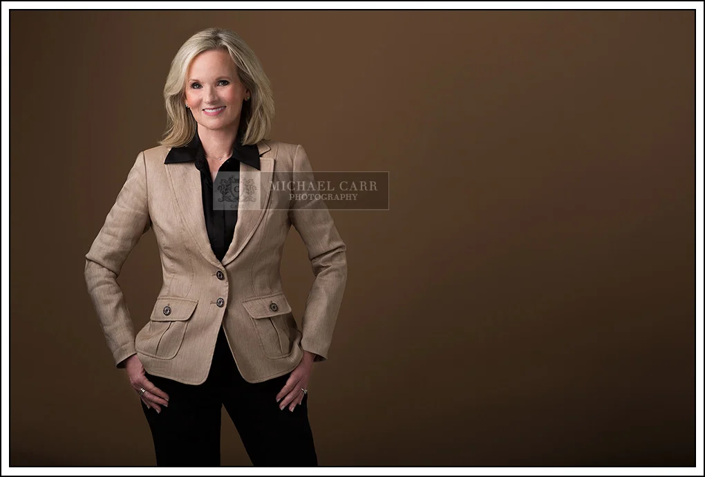 Houston personal branding portrait of woman in beige jacket