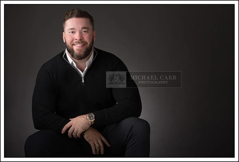 Houston personal branding portrait of male professional in black