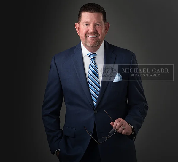 Professional corporate headshot of a Houston business professional